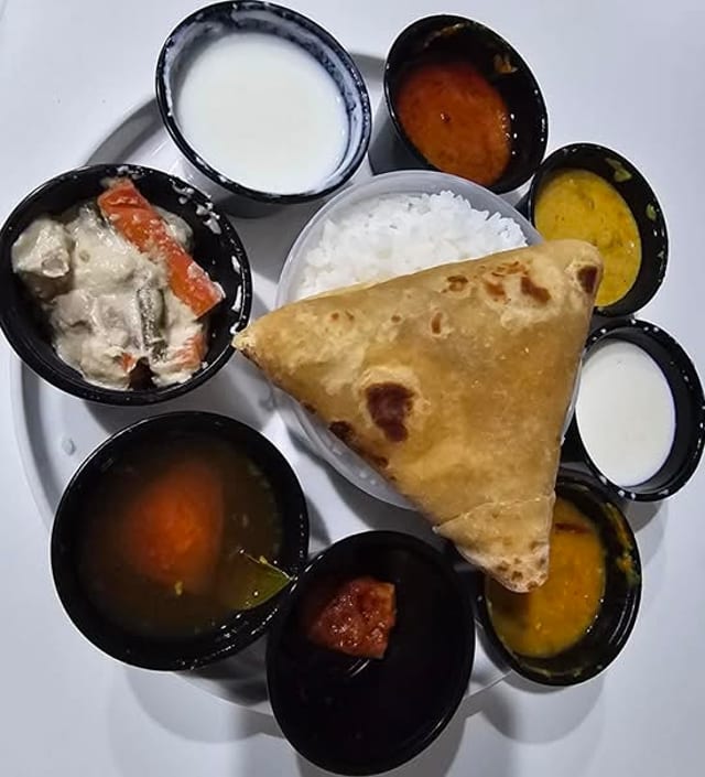 *Anjappar Vegetarian Thali.